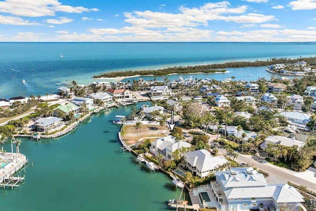 aerial view with a water view and a residential view