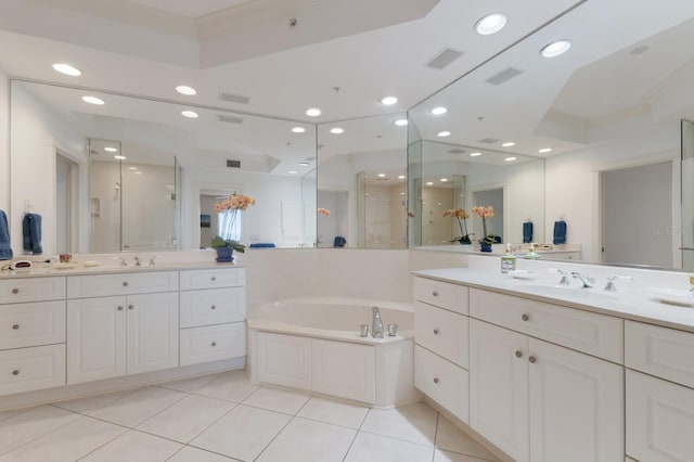 full bathroom with recessed lighting, a shower stall, a sink, and tile patterned floors