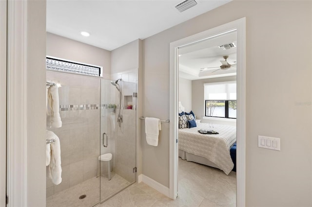 full bath featuring a stall shower, visible vents, and connected bathroom