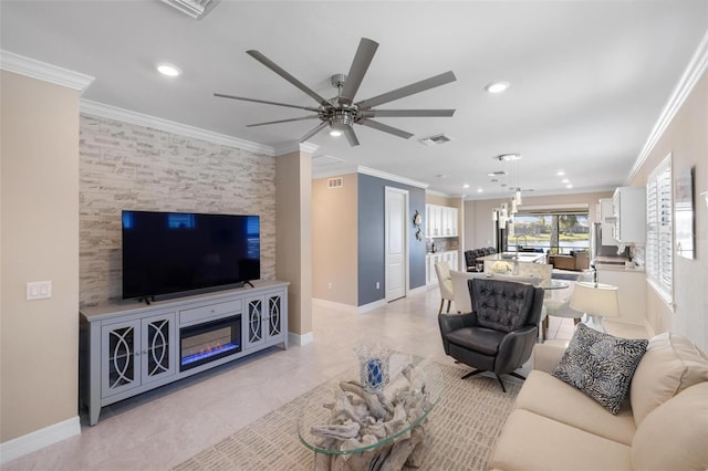 living room featuring baseboards, recessed lighting, visible vents, and crown molding