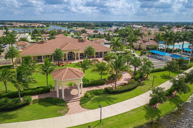 bird's eye view featuring a water view and a residential view