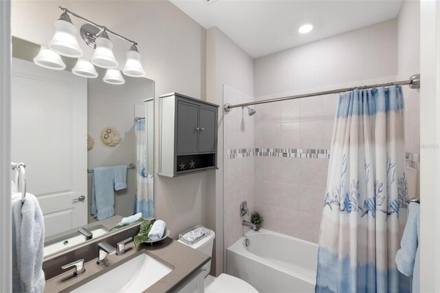 13137 Oriago St, Venice, FL 34293 - bathroom featuring shower / bath combo, toilet, recessed lighting, and vanity