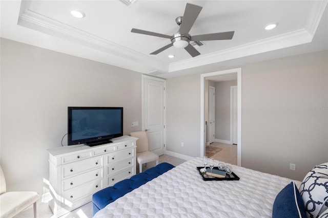 13137 Oriago St, Venice, FL 34293 - bedroom with baseboards, ornamental molding, a ceiling fan, a tray ceiling, and recessed lighting