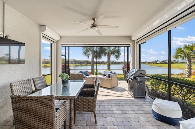 13137 Oriago St, Venice, FL 34293 - sunroom featuring a textured wall and a water view