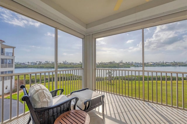 sunroom with a water view