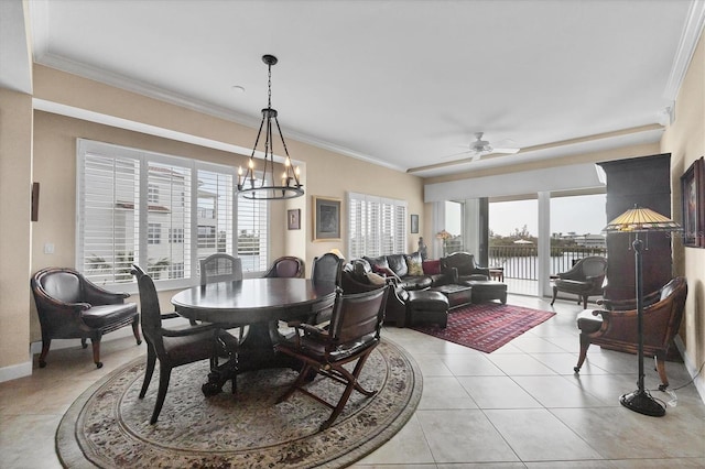 dining room featuring ornamental molding and a wealth of natural light