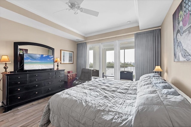 bedroom featuring ornamental molding, access to outside, ceiling fan, and wood finished floors