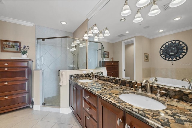 bathroom featuring ornamental molding, tile patterned flooring, a sink, and a shower stall