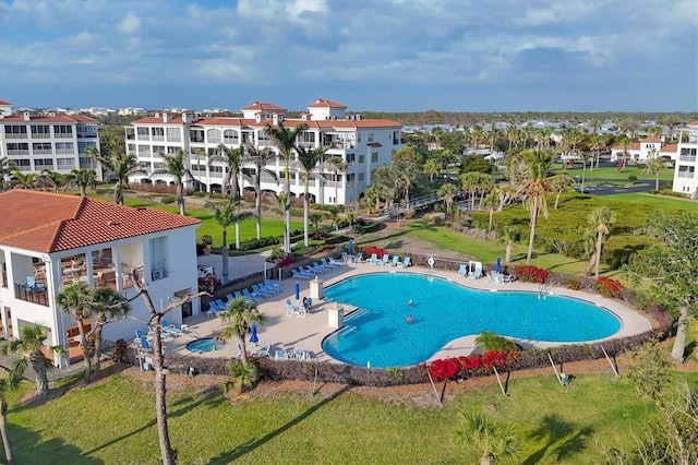 community pool featuring a patio