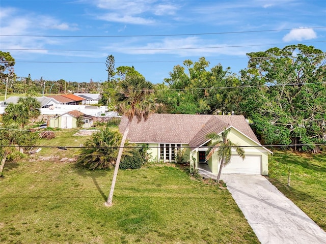 view of front of house with a garage, concrete driveway, roof with shingles, stucco siding, and a front lawn