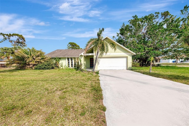 single story home with a garage, a front yard, driveway, and stucco siding