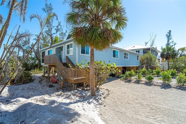 view of front of property with stairs