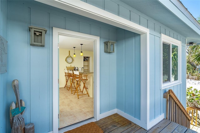 doorway to property with board and batten siding