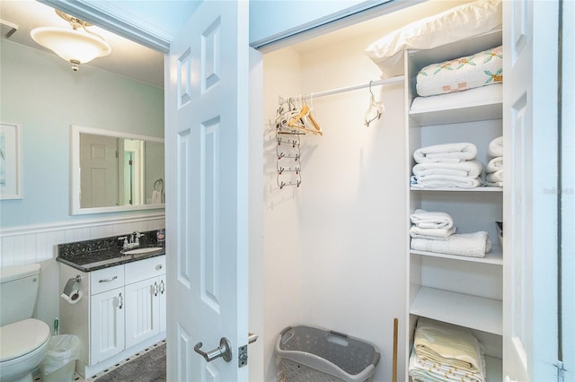 closet with a sink and visible vents