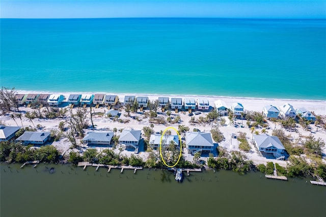 aerial view featuring a residential view and a water view