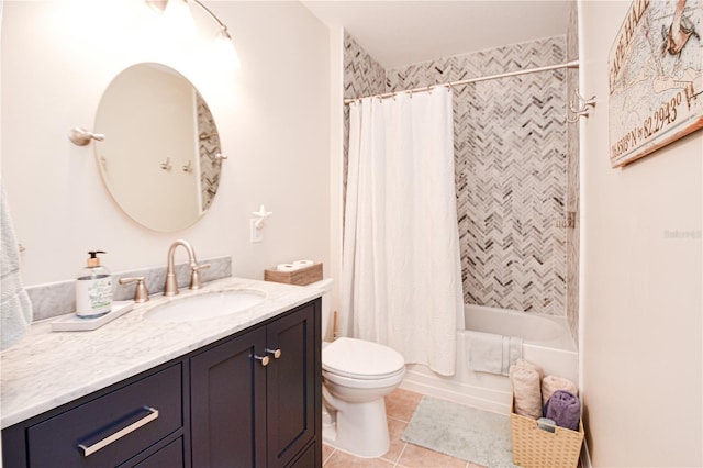 full bath with shower / bath combination with curtain, tile patterned flooring, vanity, and toilet