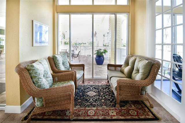 sitting room featuring baseboards