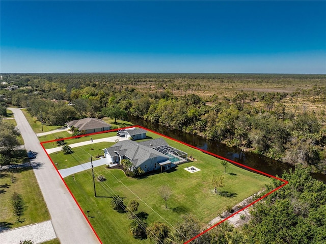 aerial view featuring a view of trees