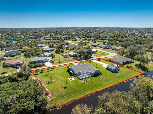 drone / aerial view featuring a water view