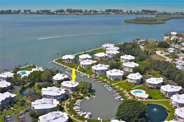 aerial view with a water view and a residential view