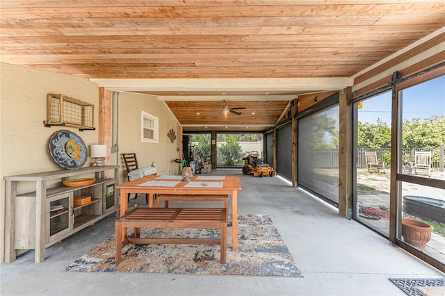 unfurnished sunroom with wooden ceiling