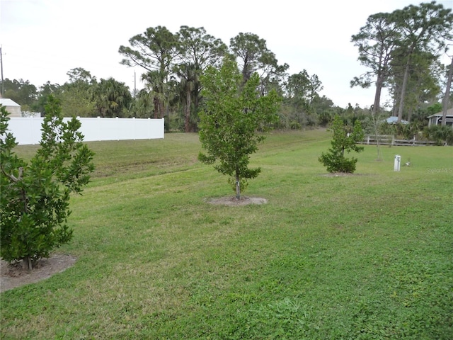 view of yard featuring fence