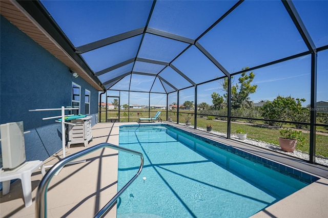 outdoor pool featuring a patio and a lanai