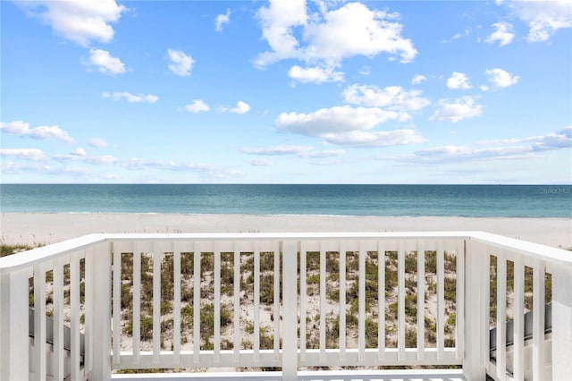 view of water feature with a beach view