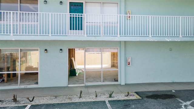 exterior space featuring stucco siding