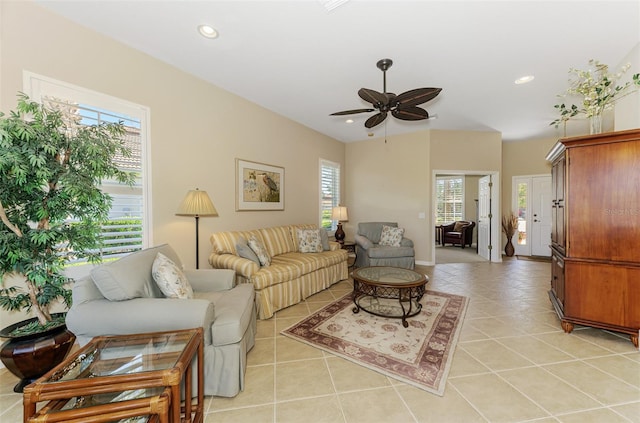 living room with light tile patterned floors, recessed lighting, and a wealth of natural light