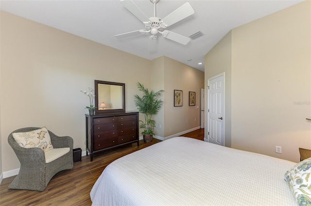 bedroom with visible vents, ceiling fan, baseboards, and wood finished floors