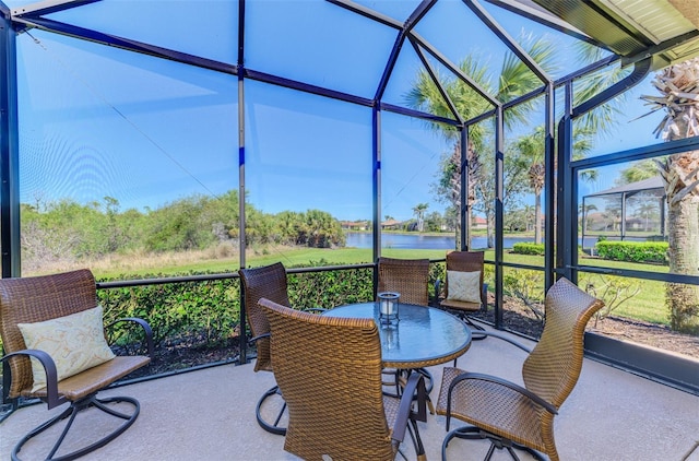 sunroom with a water view