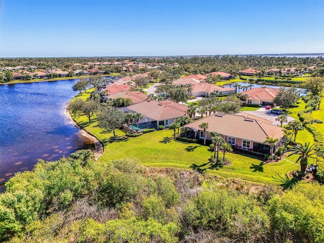 aerial view featuring a water view and a residential view