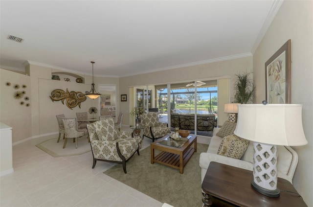 living area with visible vents, baseboards, ornamental molding, light tile patterned floors, and a sunroom