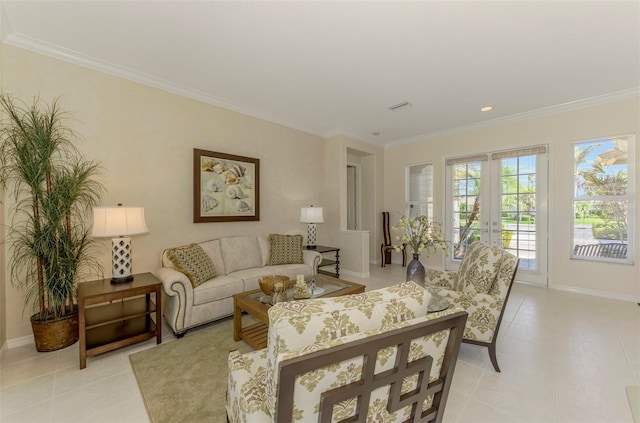 living room with light tile patterned floors, french doors, baseboards, and ornamental molding