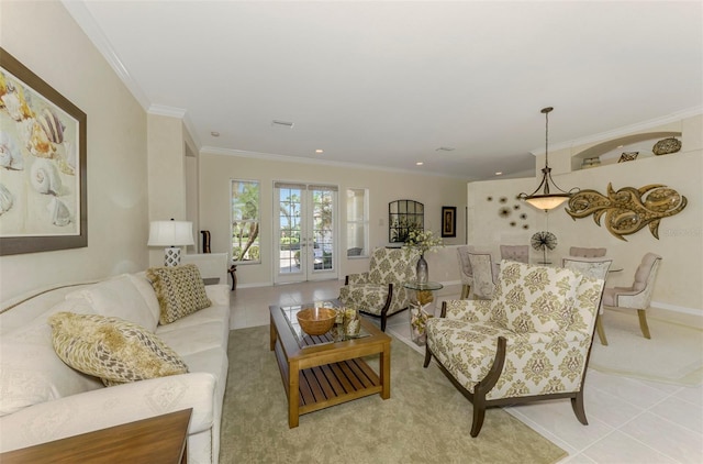 living room with light tile patterned floors, french doors, and ornamental molding