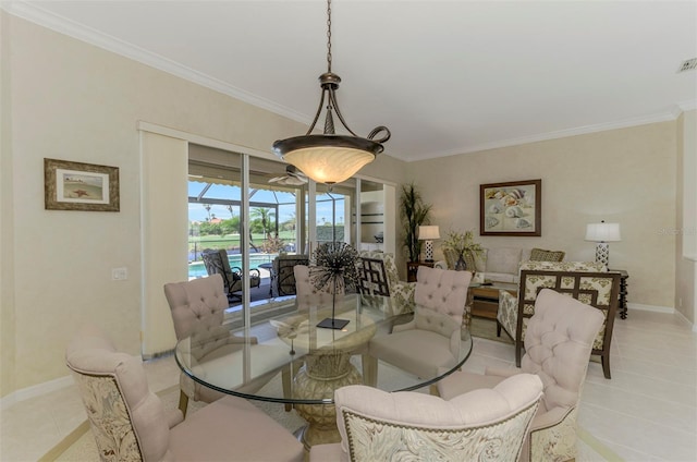 dining area with light tile patterned floors, visible vents, crown molding, and baseboards