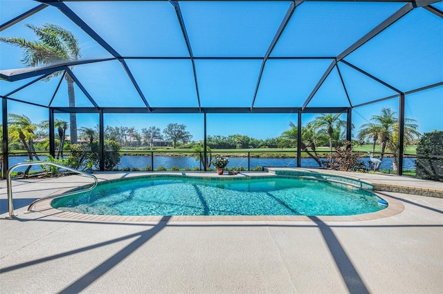 pool with glass enclosure, a water view, and a patio area