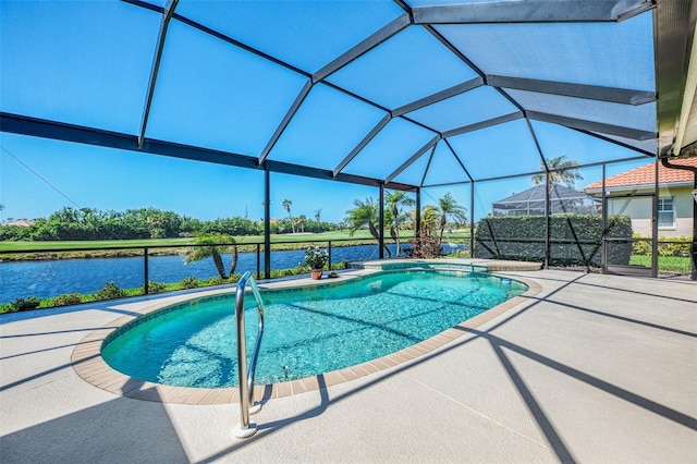 pool featuring a lanai, a patio, and a water view