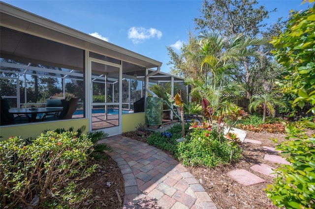 view of yard with an outdoor pool