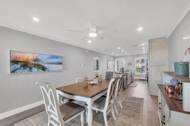 dining space featuring recessed lighting, baseboards, ceiling fan, and light wood finished floors