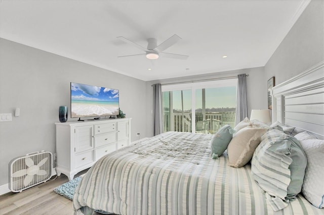 bedroom with light wood-style floors, baseboards, access to exterior, and a ceiling fan