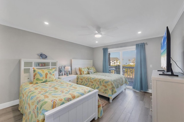 bedroom featuring crown molding, access to outside, wood finished floors, and baseboards