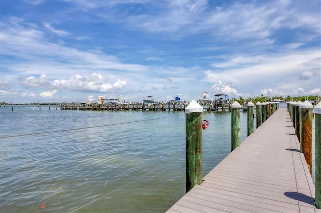 view of dock with a water view