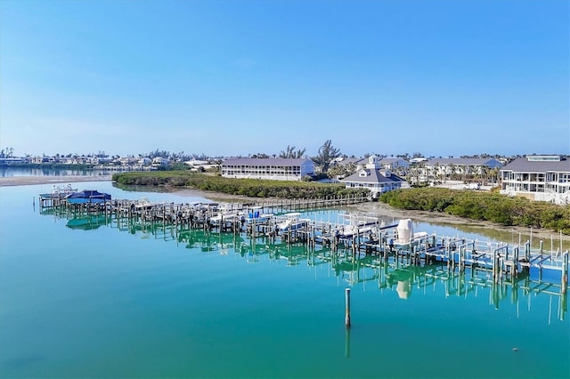 property view of water featuring a boat dock