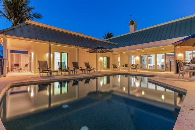 outdoor pool with a patio