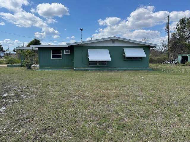 1417 Terry Ave, Punta Gorda, FL 33980 - back of property with a lawn