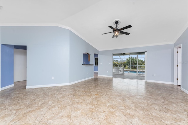 unfurnished living room featuring baseboards, crown molding, a ceiling fan, and vaulted ceiling