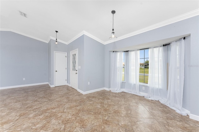 empty room with visible vents, crown molding, baseboards, and vaulted ceiling