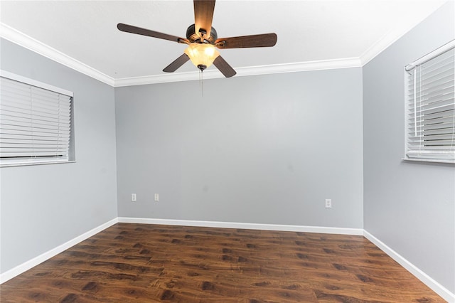 empty room with ceiling fan, baseboards, wood finished floors, and ornamental molding